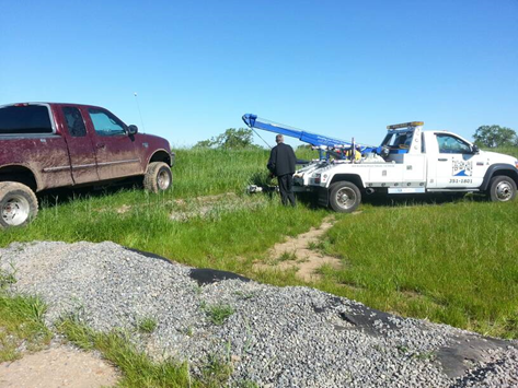 man with toing truck